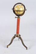 A GLOBE on a stand. 11ins high.