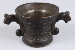 A BRONZE CENSER. 5ins diameter.