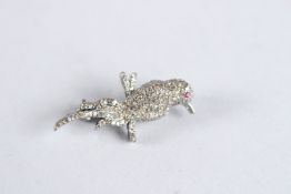 A DIAMOND PARROT BROOCH.