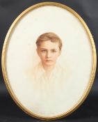 EARLY 20TH CENTURY SCHOOL Portrait of a young boy, watercolour, in oval frame, 47 x 37cm