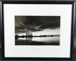POSSIBLY GERMAN SCHOOL (20TH CENTURY) Evening view of a lake, exhibition photograph, signed