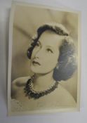 [FILMSTAR PHOTO, SIGNED] MERLE OBERON, signed, b/w photo, 7 x 5 inches.Provenance: from the