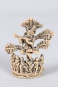 A FINE 17TH - 18TH CENTURY SOUTH INDIAN CARVED BONE FIGURE of fluting Krishna and Gopis under a