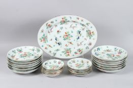 A CHINESE PART DINNER SERVICE painted with flowers and butterflies comprising twelve plates 9ins