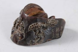 A CHINESE CARVED HORN HOOF. 4ins.