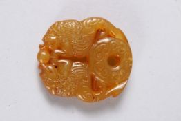 A CHINESE CIRCULAR ROUNDEL. 1.75ins.