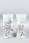 A GOOD PAIR OF CHINESE REPUBLICAN SPILL VASES with a sepia decoration of villages and mountains.