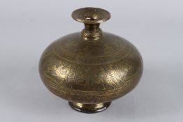 A FINELY ENGRAVED 18TH/19TH CENTURY INDIAN BRASS LOTA VESSEL. 7ins high.