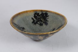 A CHINESE POTTERY CIRCULAR BOWL. 6ins diameter.