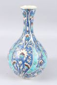A 19TH CENTURY OTTOMAN TURKISH KUTAHIYA GLAZED POTTERY VASE. 12ins high.