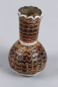 A FINE, POSSIBLY EARLY ISLAMIC OR ROMAN, MOSAIC GLASS VASE. 4ins high.