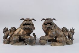 A PAIR OF CHINESE BRONZE LIONS.