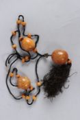 AN OTTOMAN ISLAMIC AMBER NECKLACE.