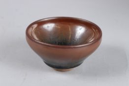 A CHINESE POTTERY CIRCULAR BOWL. 4ins diameter.