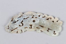 A CHINESE CARVED AND PIERCED JADE ORNAMENT specifically identified as a HETIAN JADE DRAGON