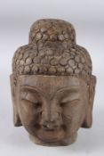 A HEAVY STONE BUDDHA HEAD. 10ins high.