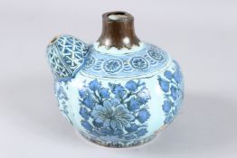 A 17TH CENTURY PERSIAN SAFAVID GLAZED POTTERY KENDI EWER. 6ins high x 5.5ins wide.