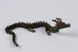 A JAPANESE OKIMONO BRONZE DRAGON with articulated body.
