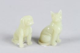 A JADE CARVING OF A DOG and a CAT. 3.5ins high.