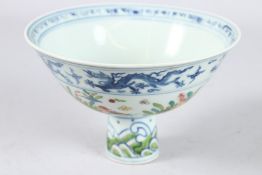 A CHINESE POLYCHROME STEM CUP.