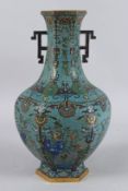 A GOOD CHINESE OCTAGONAL TWO-HANDLED VASE. 15ins high. Impressed mark.