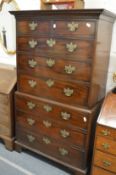 A good George III mahogany tallboy with dentil moulded cornice, original swan neck handles,