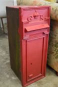 An original cast iron GR wall mounted post box.