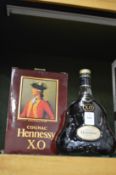 A bottle of Hennessy XO cognac, boxed.