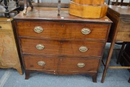 A George III mahogany straight front three drawer chest.