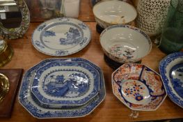 Oriental porcelain to include blue and white dishes, two bowls an Imari bowl (faults).