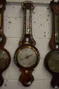 A 19th century mother of pearl inlaid rosewood barometer/thermometer.