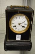 A small ebonised mantel clock, the dial signed Leroy A, Paris.