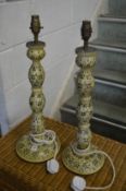 A pair of decoratively painted table lamps.