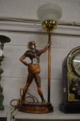 A Hagenauer copper figural lamp.