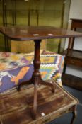 A 19th century mahogany tilt-top tripod table.
