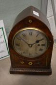 A Regency mahogany lancet shaped mantel clock.
