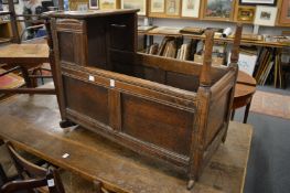 An 18th century oak cradle.