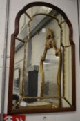 A decorative mirror.