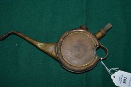 A Lucas N938 Motor Oiler oil can.