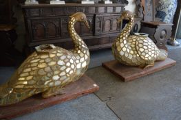 A pair of late 19th century/early 20th century Indian carved wood and mirrored peacocks,