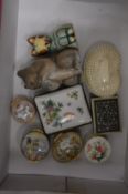Porcelain trinket boxes and other items.