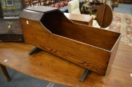 A 19th century pine cradle.