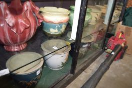 A large quantity of pottery and porcelain jardinieres.