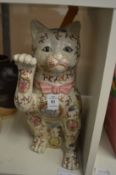 A Chinese pottery lucky cat.