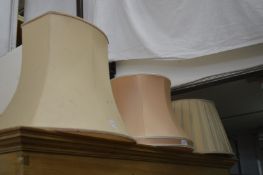 Three lamp shades.