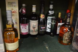 A bottle of Glenkinchie 12 year old malt whiskey and other items.