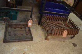 Cast iron boot scraper and a fire grate.