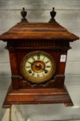 A large oak cased mantel clock.