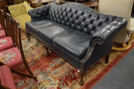 A good George III design dark blue leather upholstered humpback scroll end settee on carved cabriole