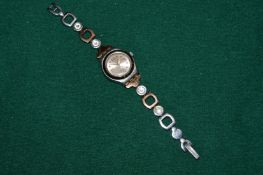 A ladies Swatch wristwatch.